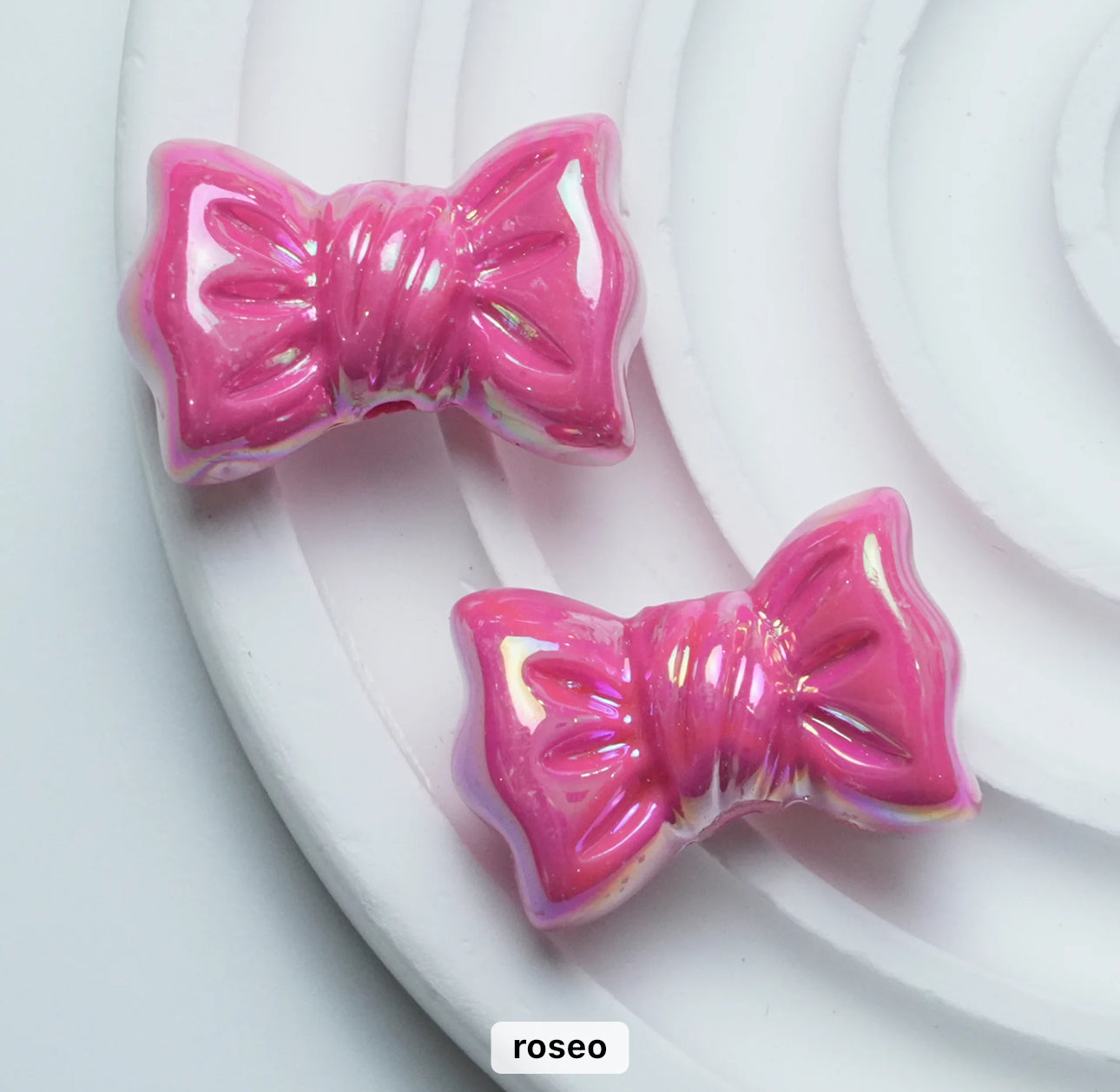 AC 1376 Candy bow shiny irrediscent Acrylic bead- per piece