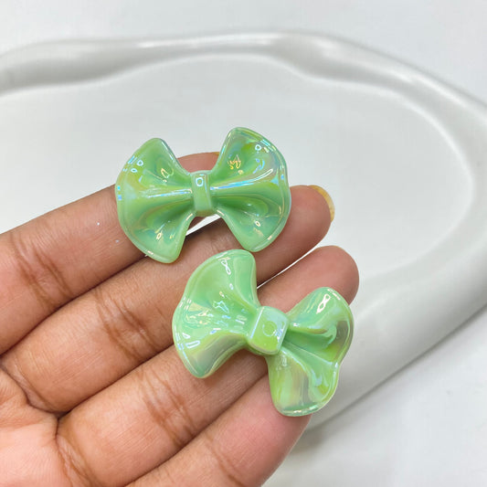 AC 1143 Green bow iridescent Acrylic bead - per piece