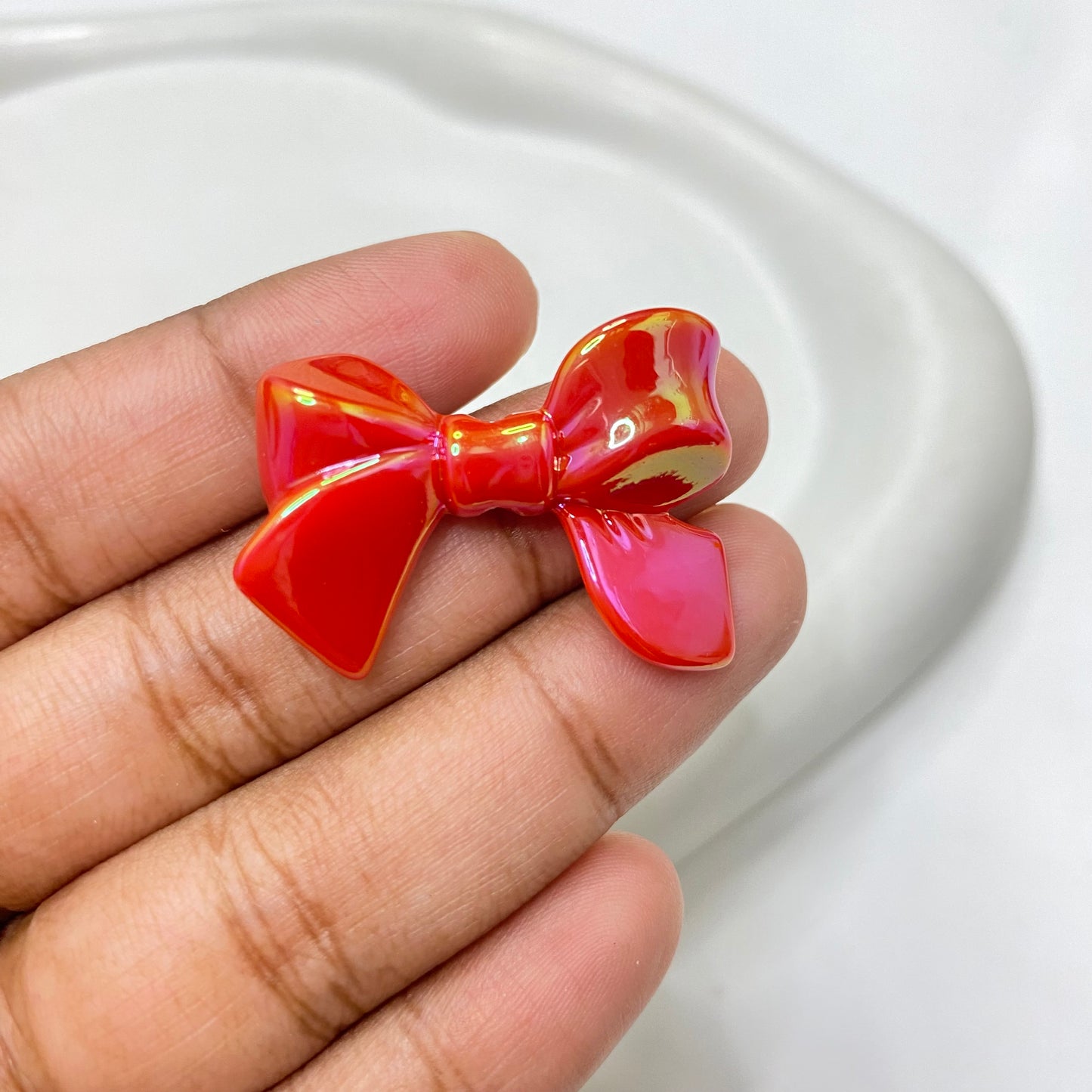 AC 1463 Bow uv plated shiny irrediscent Acrylic bead- per piece