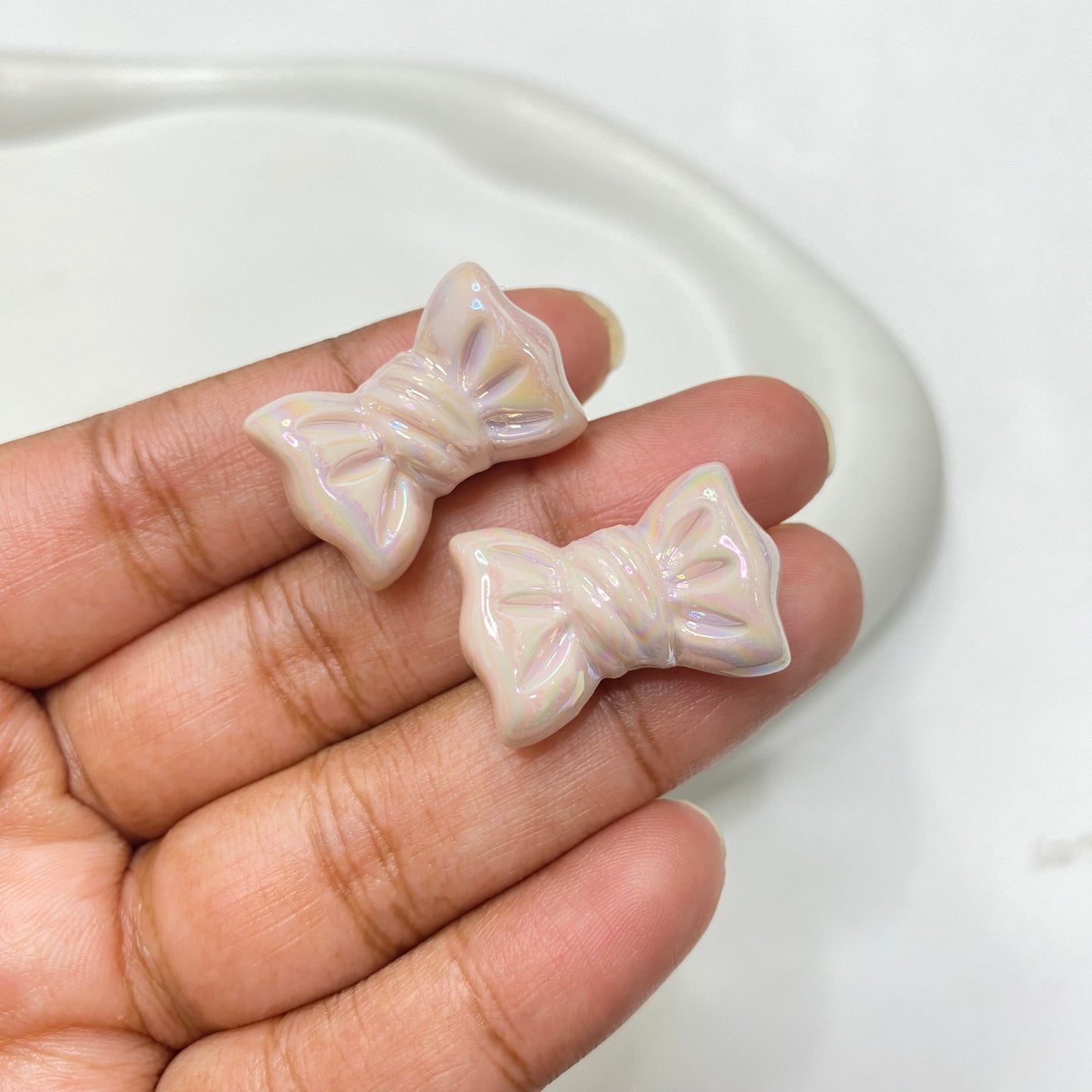 AC 1375 Candy bow shiny irrediscent Acrylic bead- per piece