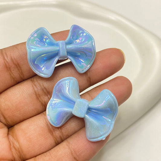 AC 1145 Blue bow iridescent Acrylic bead - per piece