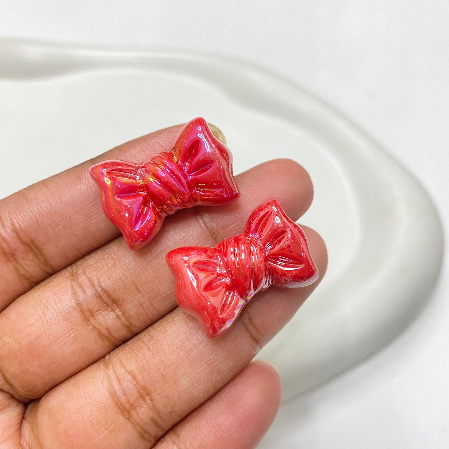 AC 1379 Candy bow shiny irrediscent Acrylic bead- per piece