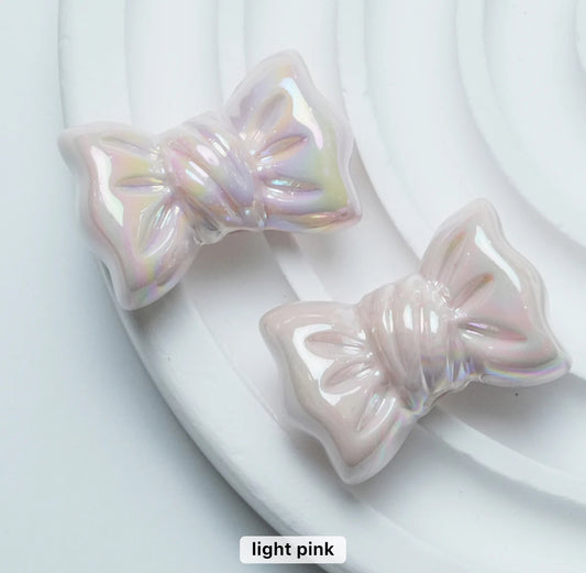 AC 1375 Candy bow shiny irrediscent Acrylic bead- per piece