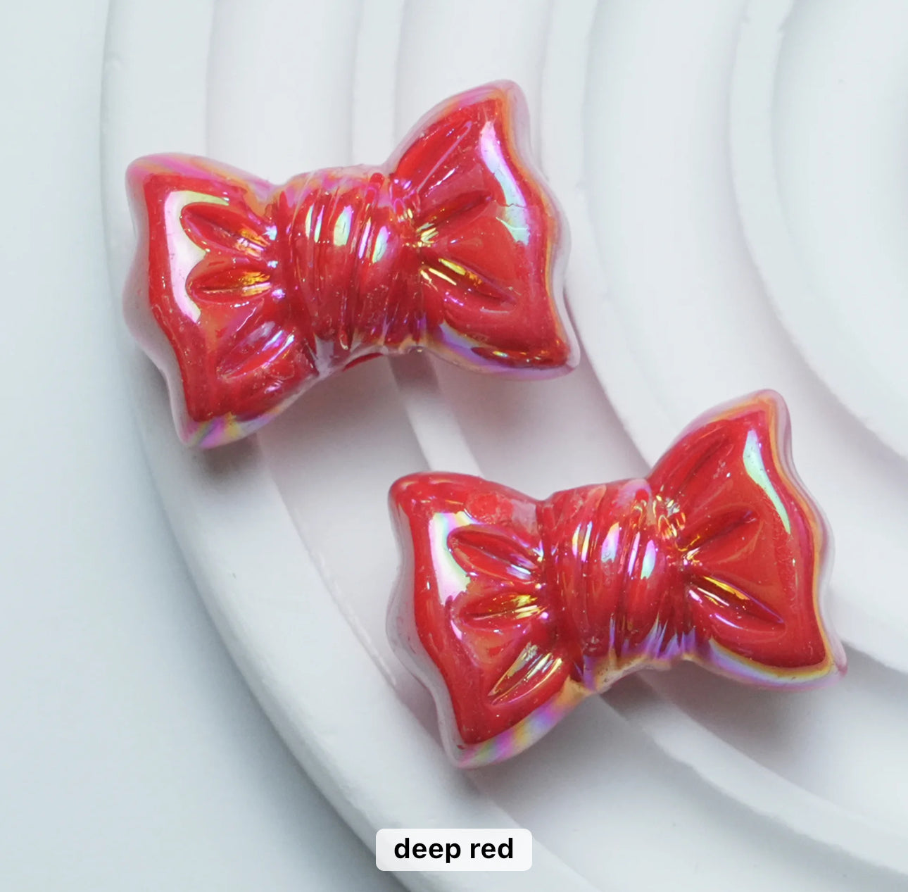 AC 1379 Candy bow shiny irrediscent Acrylic bead- per piece