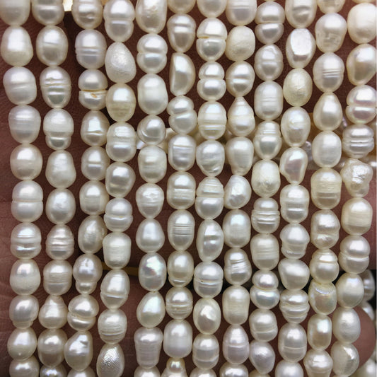 P 305 AA+ Baroque Rice pearls - per piece