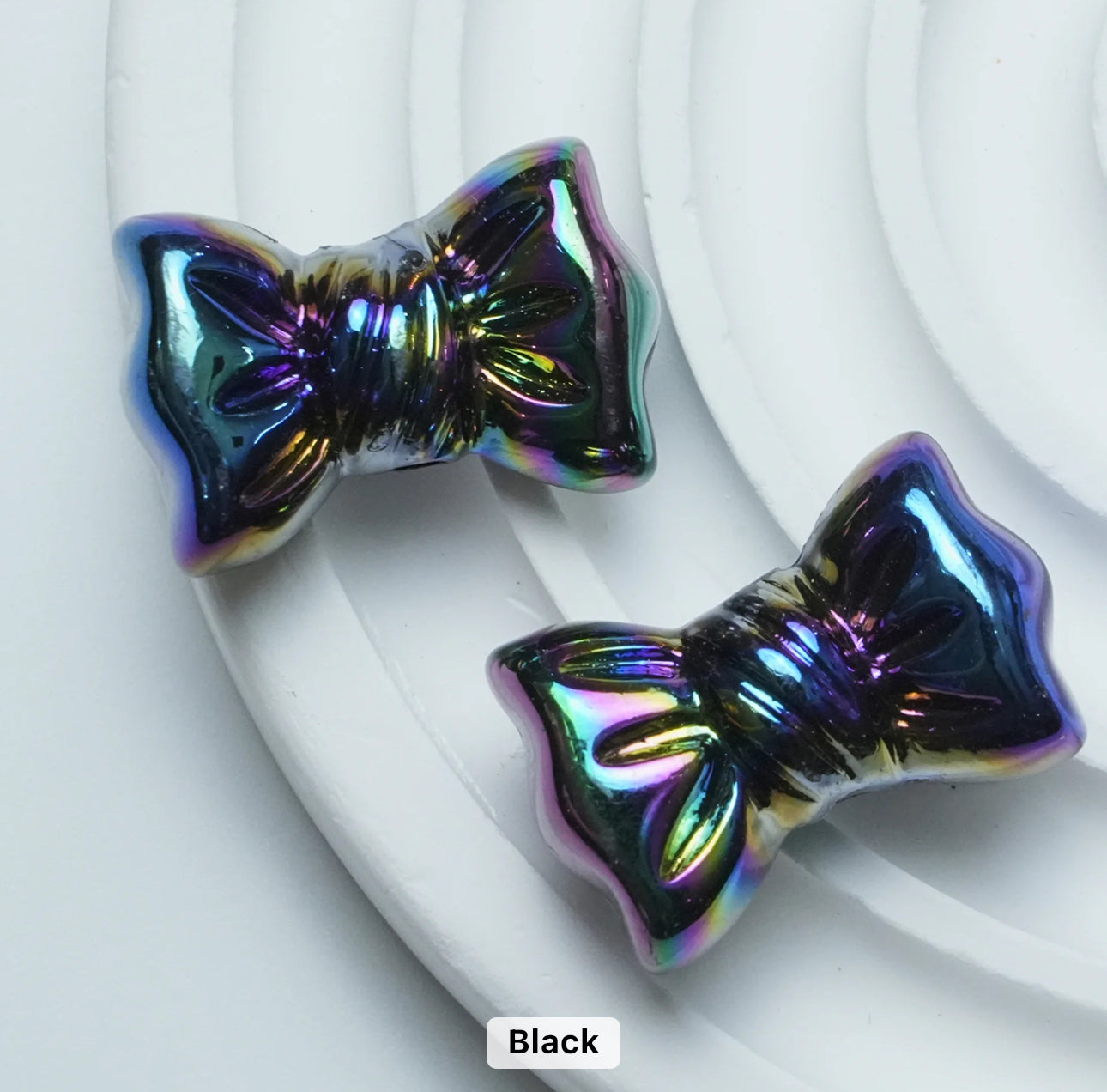 AC 1374 Candy bow shiny irrediscent Acrylic bead- per piece