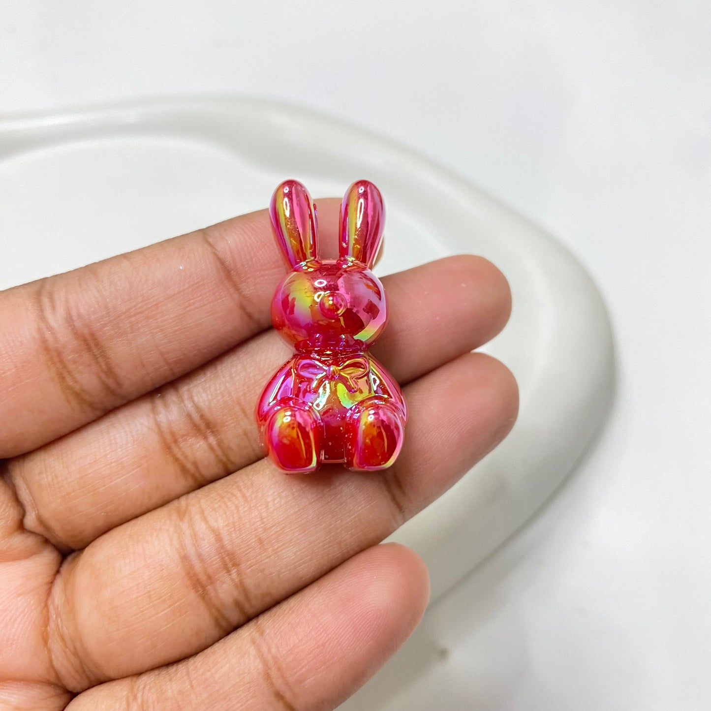 AC 1480 Rabbit uv plated shiny irrediscent Acrylic bead- per piece