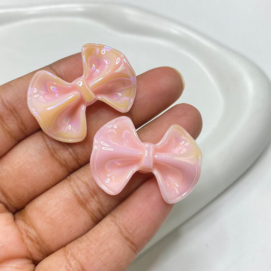 AC 1141 pink bow iridescent Acrylic bead - per piece