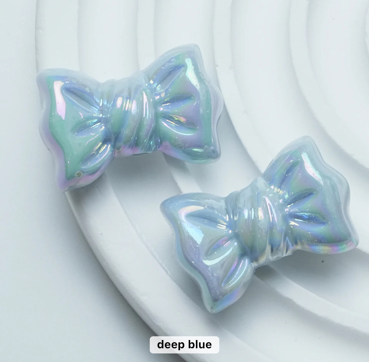 AC 1378 Candy bow shiny irrediscent Acrylic bead- per piece