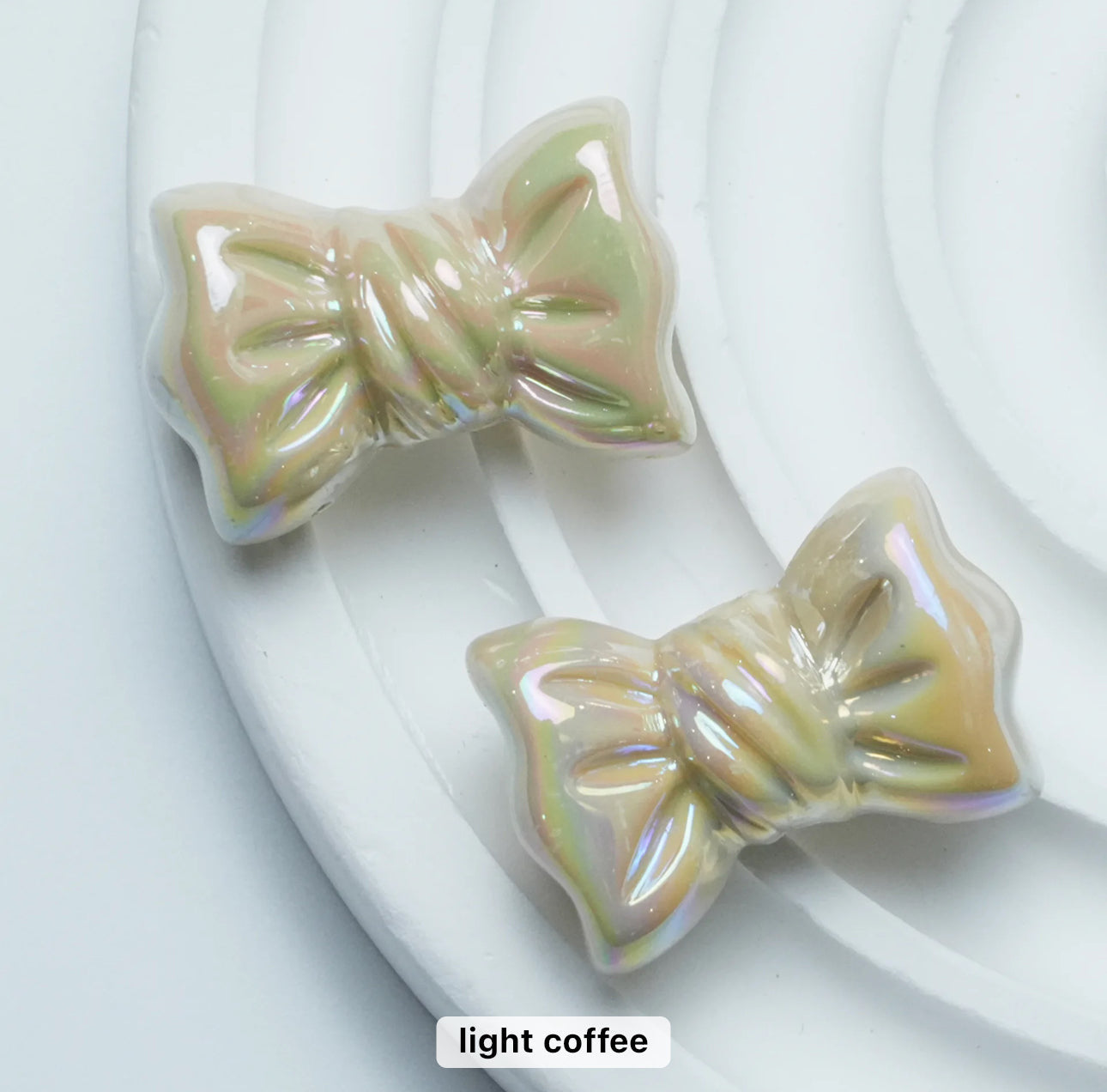 AC 1380 Candy bow shiny irrediscent Acrylic bead- per piece